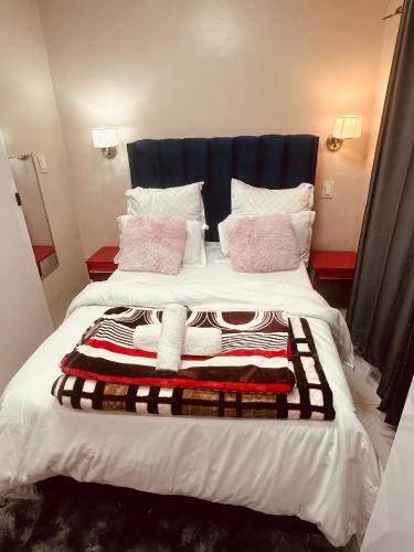 Ένα ή περισσότερα κρεβάτια σε δωμάτιο στο Forest Home Accommodation