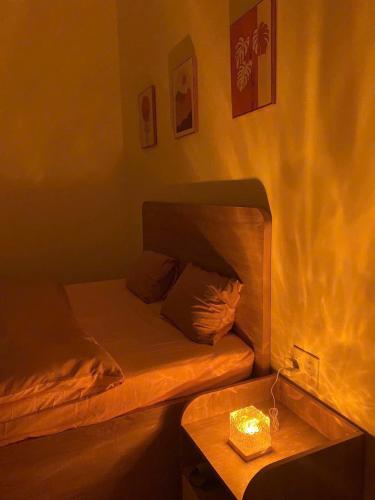 Postel nebo postele na pokoji v ubytování Homestay Là Nhà