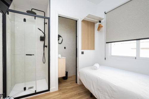 Katil atau katil-katil dalam bilik di Hostal Alicia