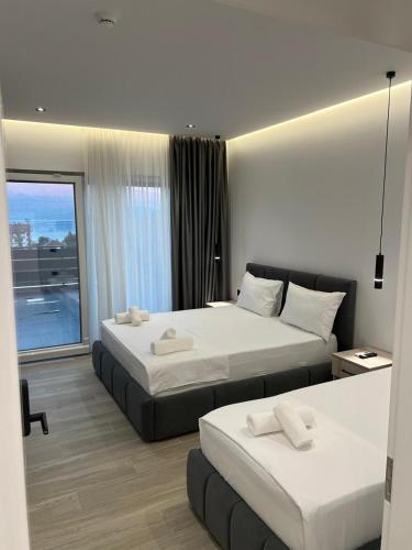 Ένα ή περισσότερα κρεβάτια σε δωμάτιο στο Hotel Restorant Binjaket