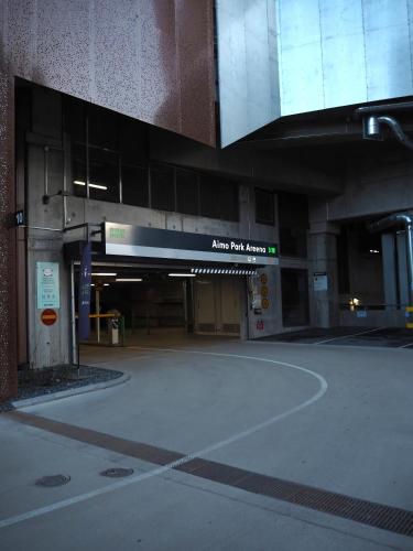 an empty parking lot in a building at Wallesmanni - Nokia Arena prime location apartments by Come in! in Tampere