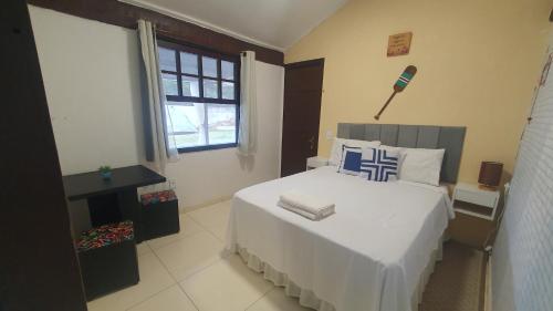 Ένα ή περισσότερα κρεβάτια σε δωμάτιο στο Marina Beach Guest House
