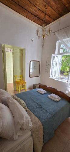 Katil atau katil-katil dalam bilik di Casa Violeta by 8essentially
