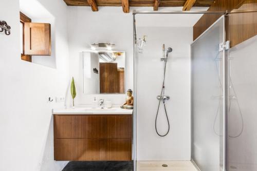 a bathroom with a shower and a sink at Luxury 9 Bedroom Villa in Ibiza City, 1250 in Sant Carles de Peralta