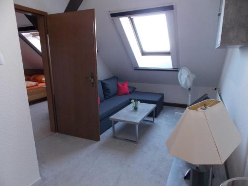 Ruang duduk di Ferienwohnung Mohnblume