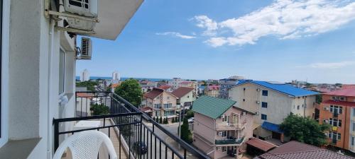 a view of a city from a balcony at Hotel Blue Sky Resort in Eforie Nord