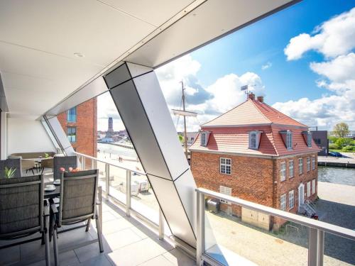 Ein Balkon oder eine Terrasse in der Unterkunft Hafenspitze App. 23