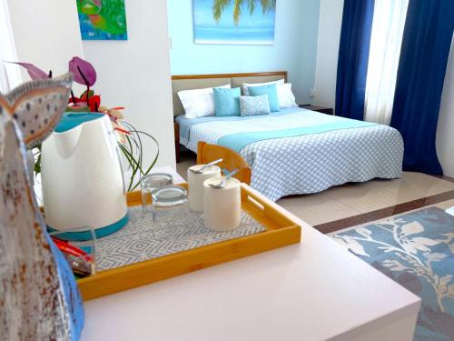 Una cama o camas en una habitación de Residence Le Point Choisy