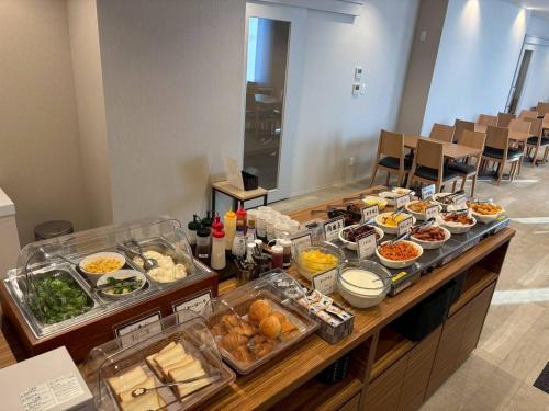 a buffet with many different types of food on it at Hotel Crown Hills GOI in Ichihara