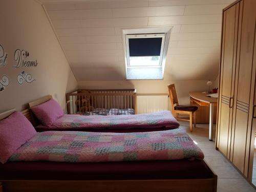 Postel nebo postele na pokoji v ubytování Ferienwohnung