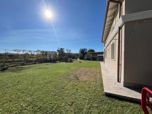 a yard next to a house with a light on it at SlowCasa in Torrevecchia Teatina