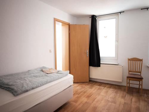 Postel nebo postele na pokoji v ubytování Apartment in Apolda