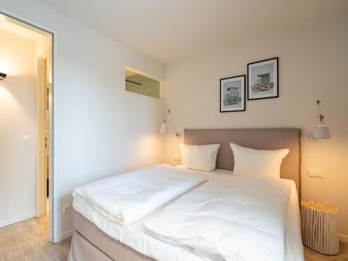 Una cama o camas en una habitación de Forum Marinar, App 22