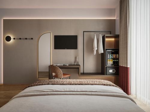 Ένα ή περισσότερα κρεβάτια σε δωμάτιο στο Mokinba Hotels Baviera