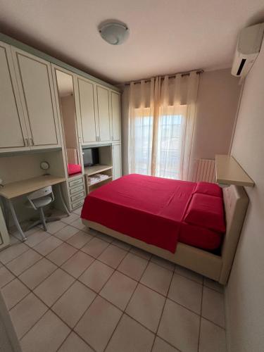 Ένα ή περισσότερα κρεβάτια σε δωμάτιο στο B&B Villa dei Fiori