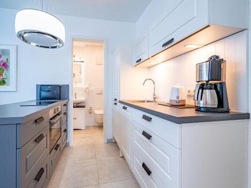 Kuchyň nebo kuchyňský kout v ubytování Quartier 7, App 06