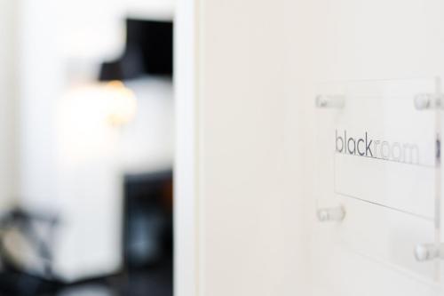 a door with a sign that reads blockcolm at Nova Suite in Catania
