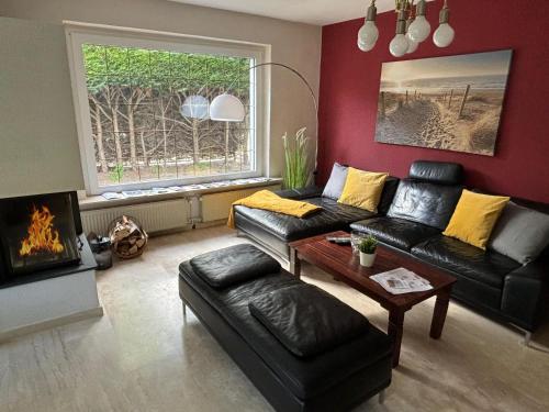 Χώρος καθιστικού στο Ostseebad Göhren 8-Personen-Ferienhaus mit beh WPool