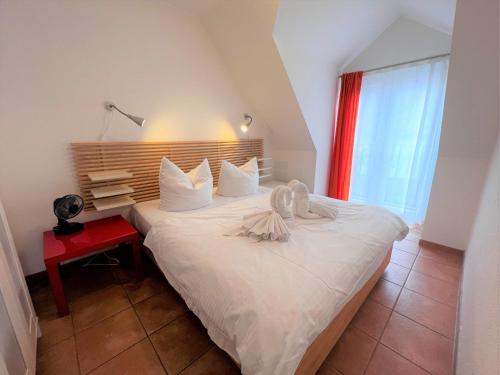 Ένα ή περισσότερα κρεβάτια σε δωμάτιο στο Ferienhaus Dollahner