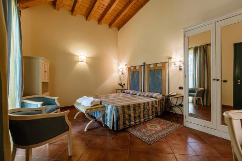 Ένα ή περισσότερα κρεβάτια σε δωμάτιο στο Villa Sofia Hotel