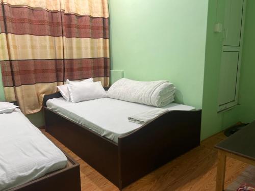 Postel nebo postele na pokoji v ubytování Local point homestay
