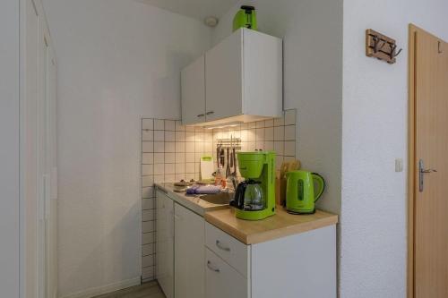 Kuchyň nebo kuchyňský kout v ubytování Hafenhaus Unterwasserwelt