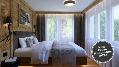 Letto o letti in una camera di La Perle Apartments