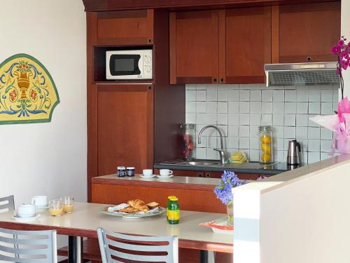 Η κουζίνα ή μικρή κουζίνα στο Residenza dei Cavalleggeri