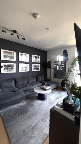 a living room with a couch and a table at Center of Hollywood in Los Angeles