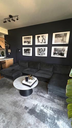 a living room with a couch and a coffee table at Center of Hollywood in Los Angeles