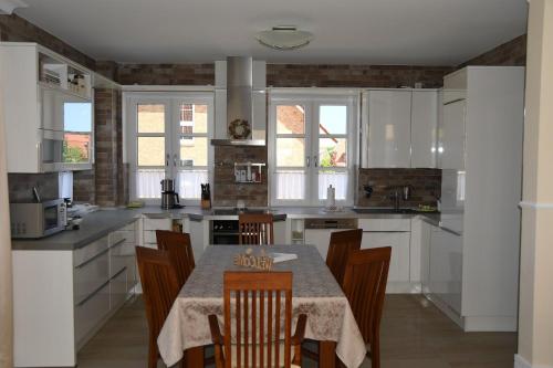 Kuchyň nebo kuchyňský kout v ubytování Ferienhaus "Strandvilla Deluxe"