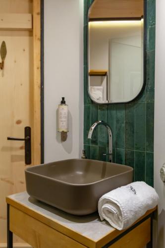 a bathroom with a large sink and a mirror at Leśniczówka u Zięby in Kościelisko