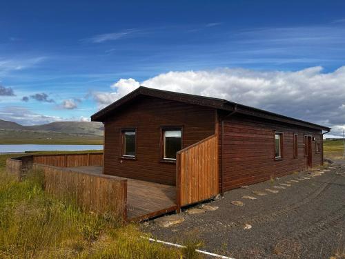 a small building on the side of a road at Lakeside Lodge at Sindrastaðir in Lækjamót