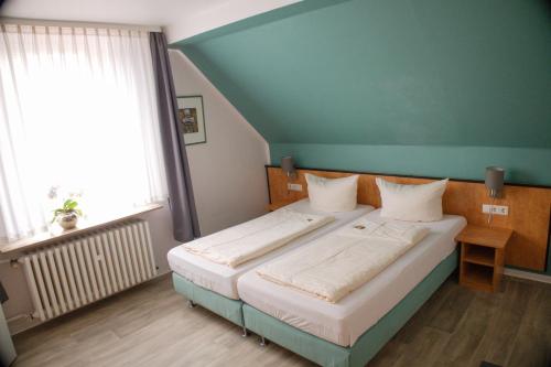Cama o camas de una habitación en Hotel Grütering