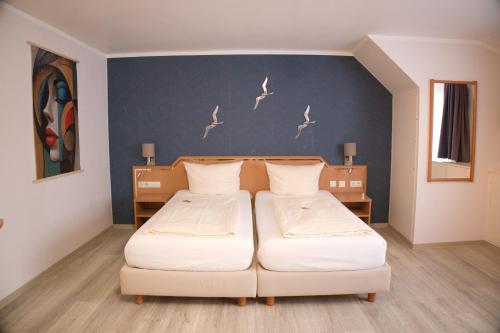 Cama o camas de una habitación en Hotel Grütering
