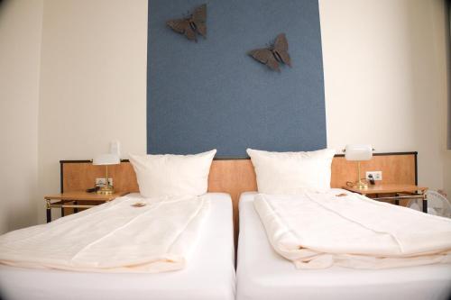 Cama o camas de una habitación en Hotel Grütering