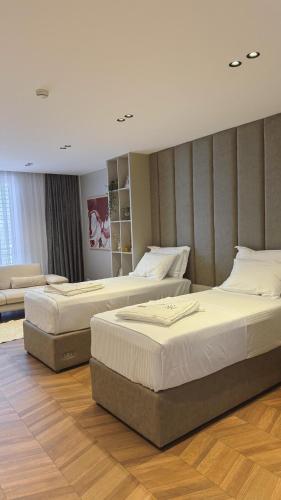 Una cama o camas en una habitación de Hotel Ari Gjakove