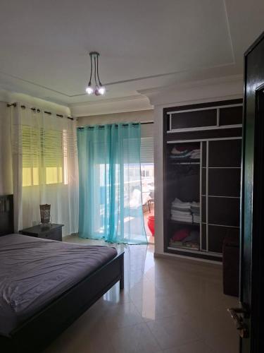 Katil atau katil-katil dalam bilik di Appartement vu sur Mer
