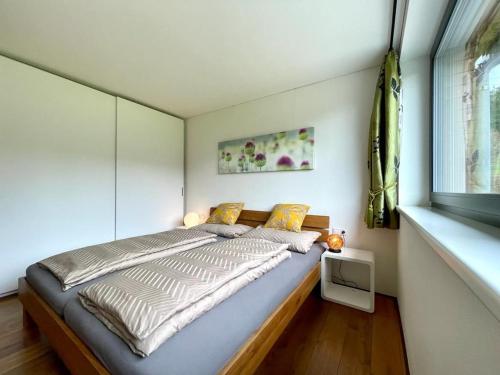 Postel nebo postele na pokoji v ubytování Haralds exklusives Ferienhaus in Langenegg