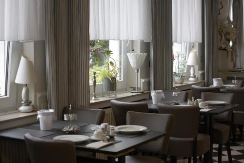Un restaurante o sitio para comer en Hotel Grütering