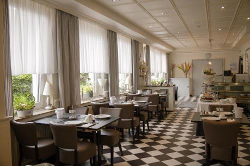 Un restaurante o sitio para comer en Hotel Grütering