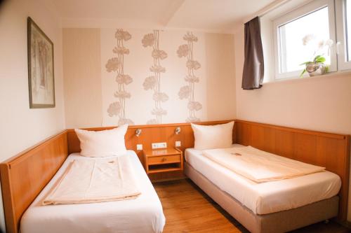 Cama o camas de una habitación en Hotel Grütering