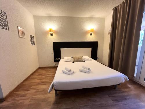 Photo de la galerie de l'établissement ST FLORENT Studio avec piscine FLO23, à Saint-Florent