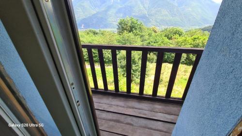 a balcony with a view of a mountain view at Country House La Villa in Villadossola
