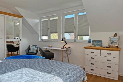 Una cama o camas en una habitación de Sonnenbirke