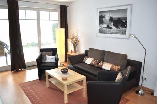 Χώρος καθιστικού στο Residenz Johannsens Ferienwohnung Nr 04