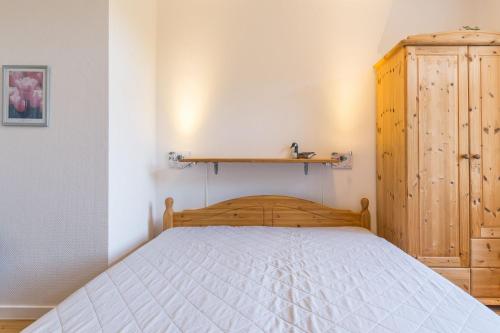 Postel nebo postele na pokoji v ubytování Haus Tarnewitz, Ferienwohnung 01