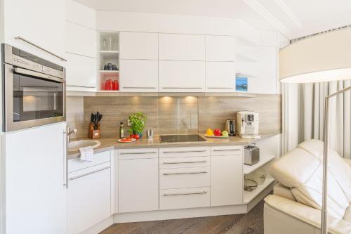 Η κουζίνα ή μικρή κουζίνα στο Villa Gruner App 10