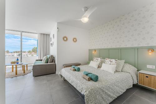 En eller flere senge i et værelse på Green Home 423 Golf del Sur