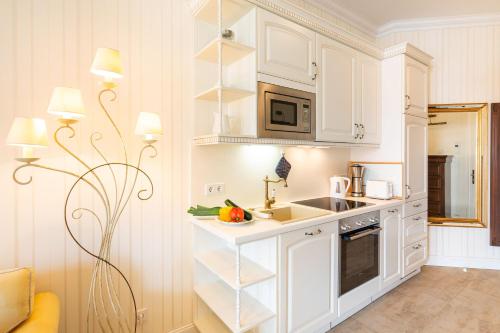 Η κουζίνα ή μικρή κουζίνα στο Villa Gruner App 1b